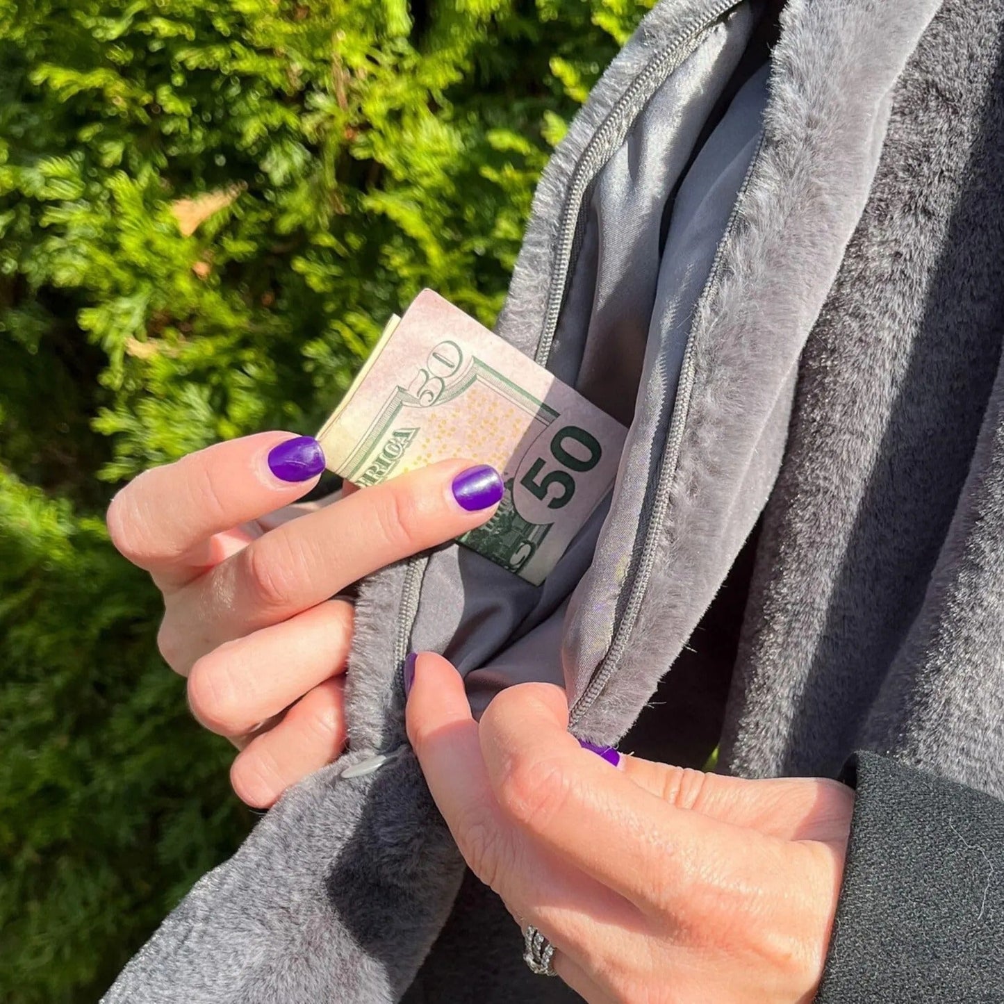 Scarf with hidden zipper pocket